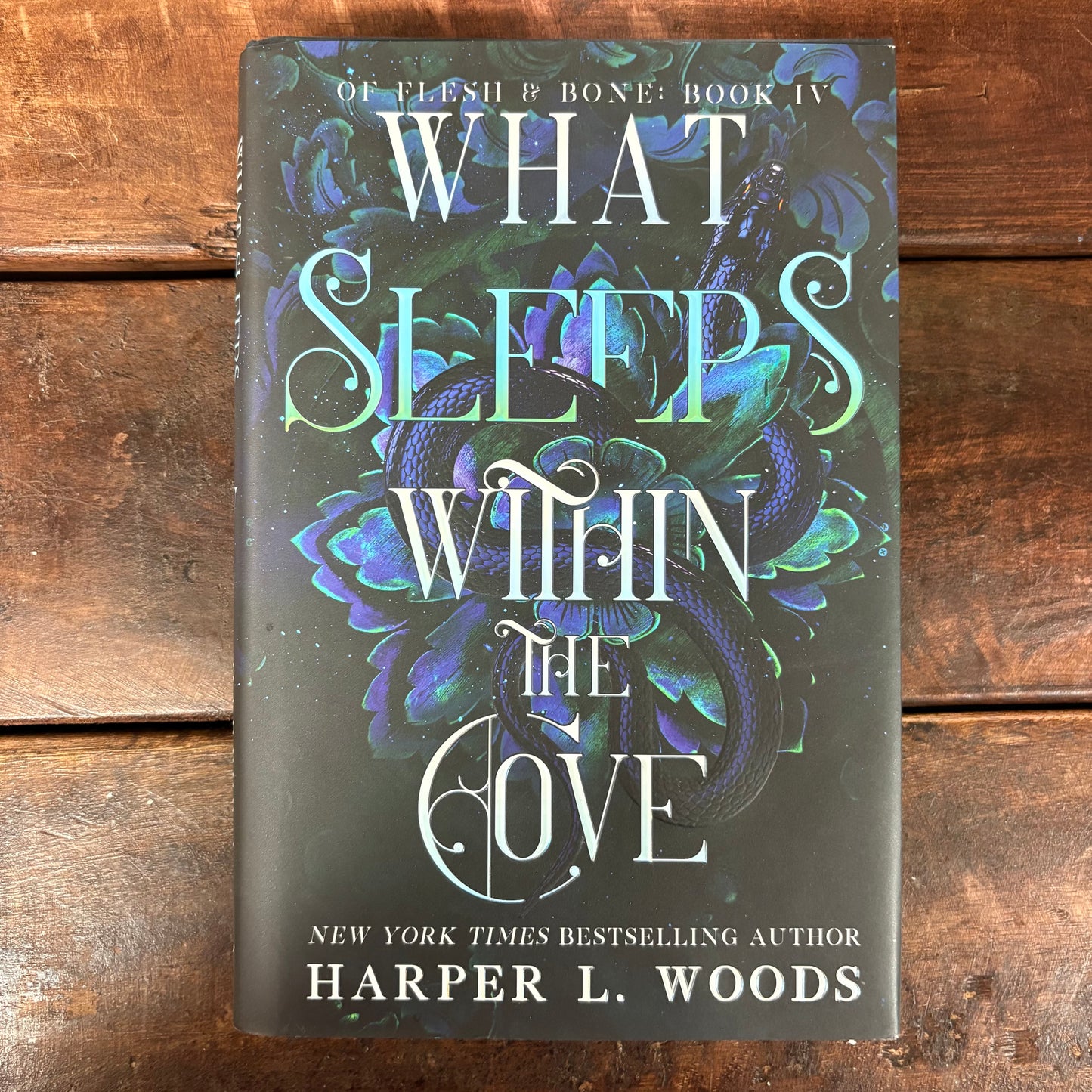 What Sleeps Within The Cove - Harper L. Woods - BOUT