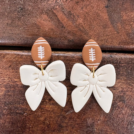 White Football and Bow Earrings - Clayhouse Colors